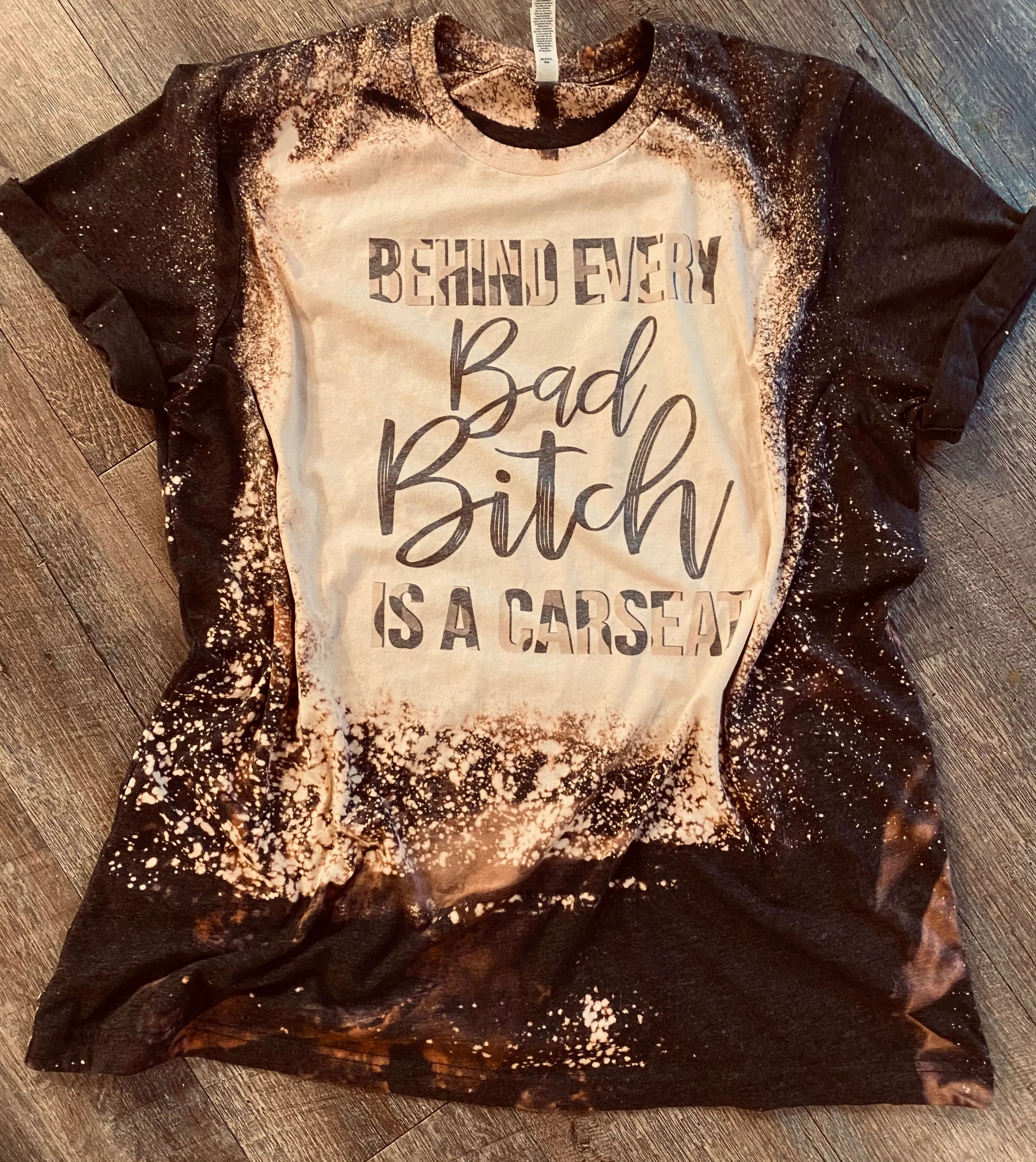 Behind every bad bitch is a Car seat. Charcoal Bleached Tee.